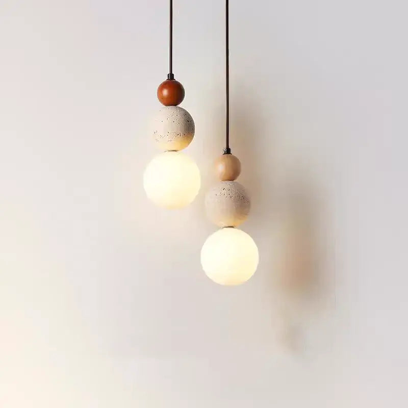 Orbe Terra — Lámpara colgante de travertino, madera y vidrio